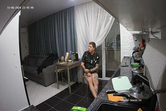 Jutta and guest guy relax and talk in Kitchen,Nov 6